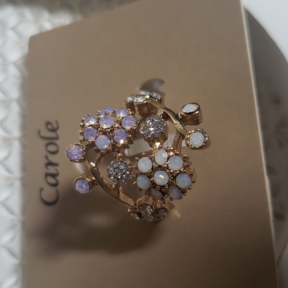 Pick and white flower ring